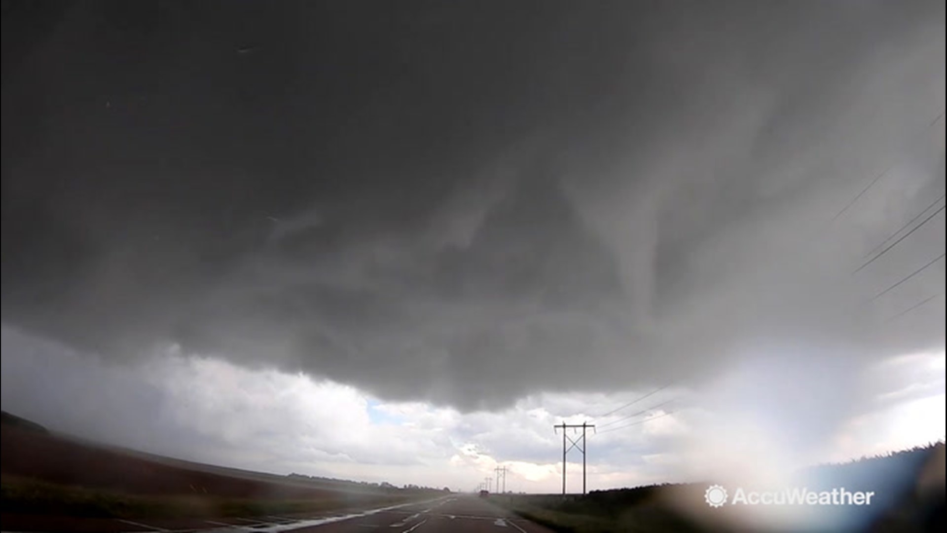 Time-lapse video of a tornadogenesis forming looks like some kind of ...