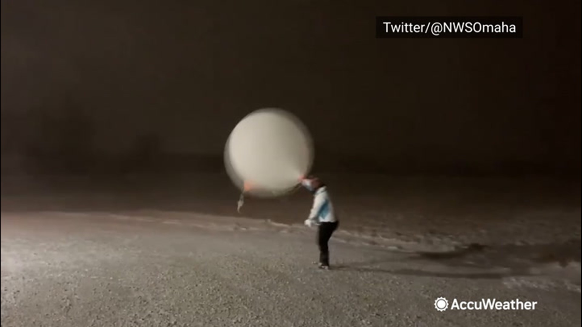 As potent winds whipped up snow, one meteorologist with the National Weather Service in Omaha, Nebraska, braved the elements to launch a weather balloon.