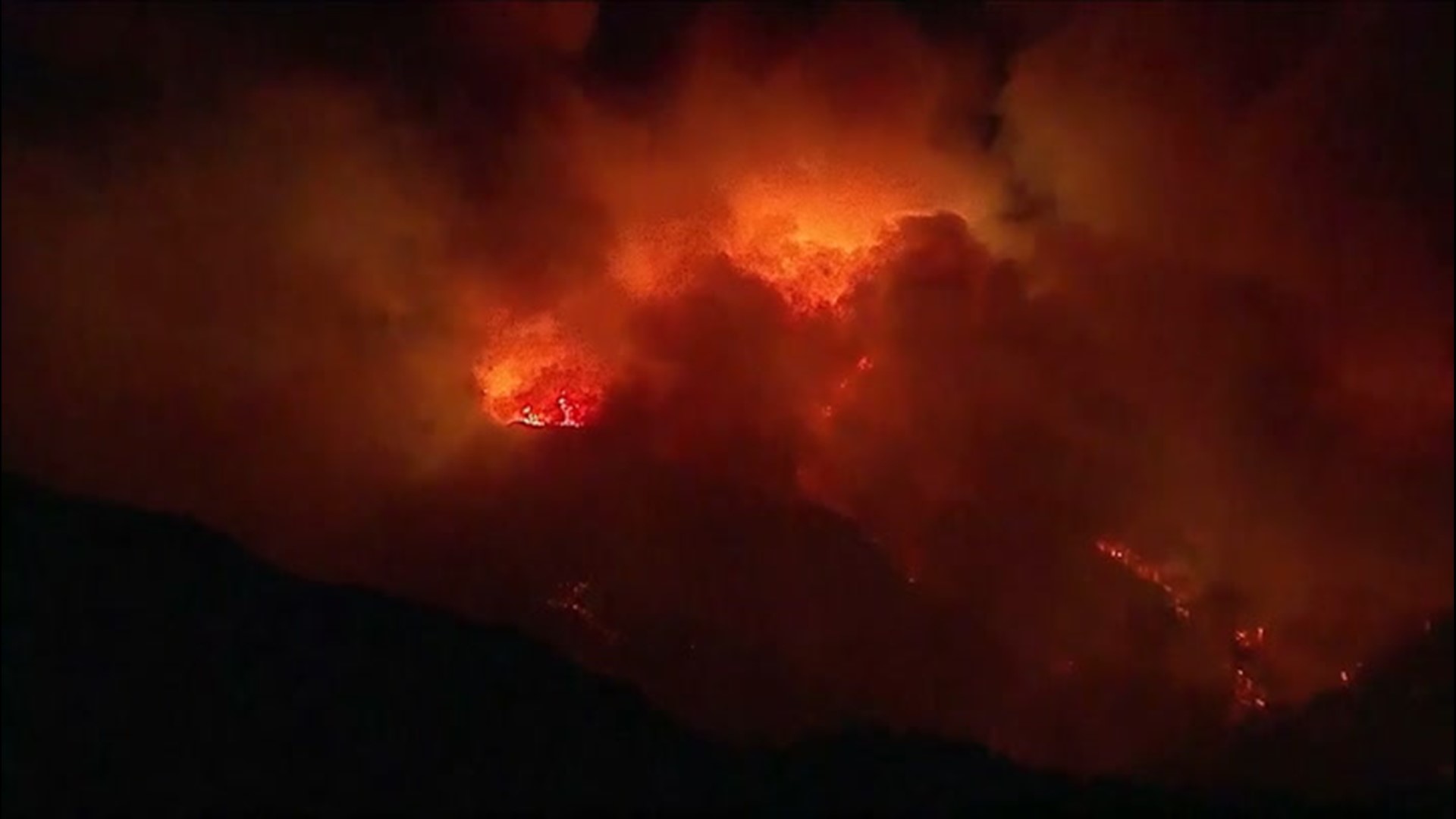 Aerial footage captured over the Bobcat Fire, shows the massive wildfire raging out of control in Los Angeles County, California, on Sept. 20. Firefighters have been battling the blaze for more than two weeks.