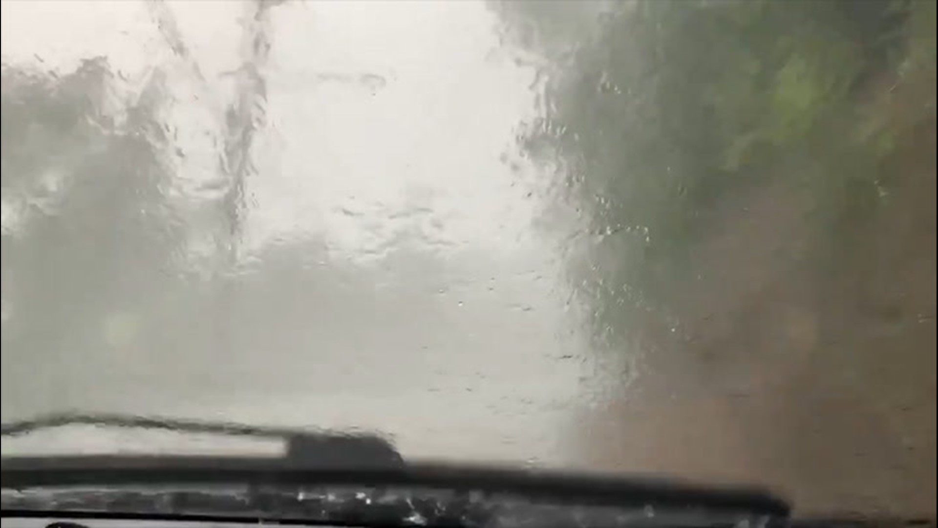 Driving in Midland, Pennsylvania, proved difficult on May 29 as a downpour of hail and rain slammed into the town.