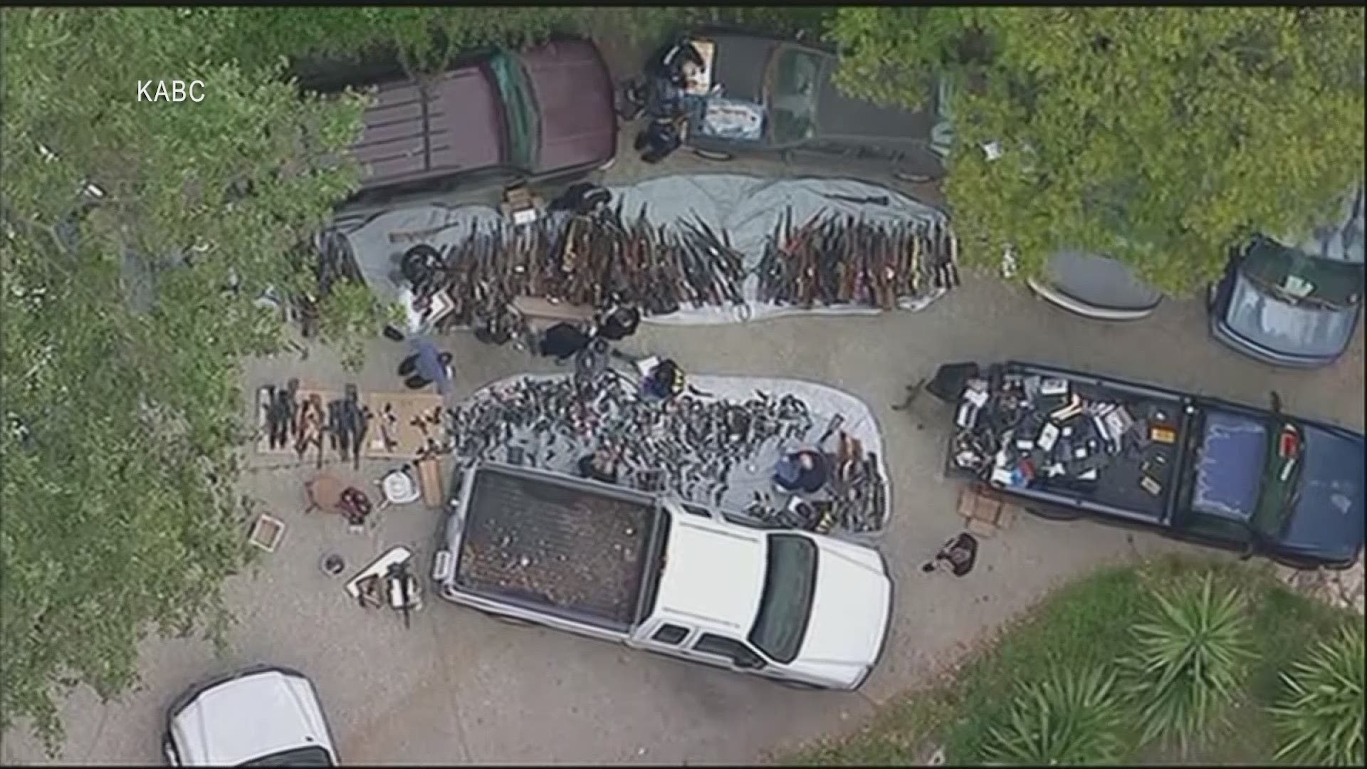 Authorities seized more than a thousand guns from a large Los Angeles home after getting an anonymous tip regarding illegal firearms sales. (KABC via AP)