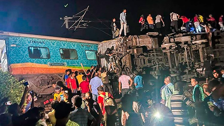 More than 230 killed and 900 hurt after 2 trains derail in India, hundreds still trapped
