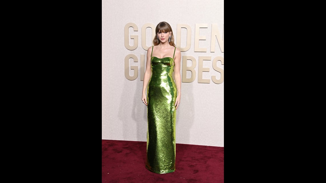 Taylor Swift Braves the Rain in a Green Dress as She Visits NYC Recording  Studio | ktvb.com