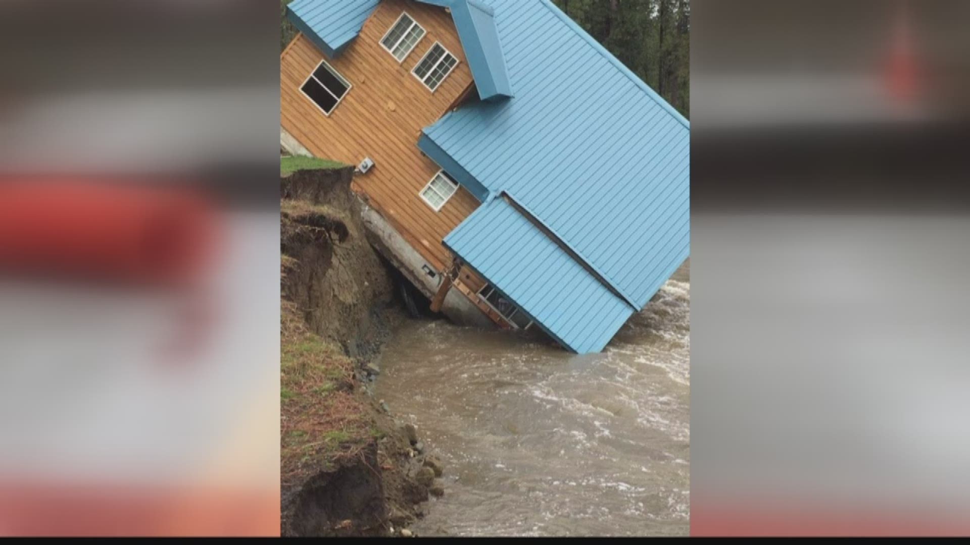 Part of the ground below the house gave way and now it's tipping in to the San Poil River.