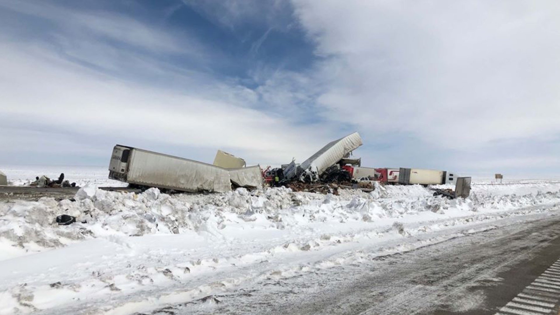 3 dead, dozens injured in a pileup of more than 100 vehicles on snowy