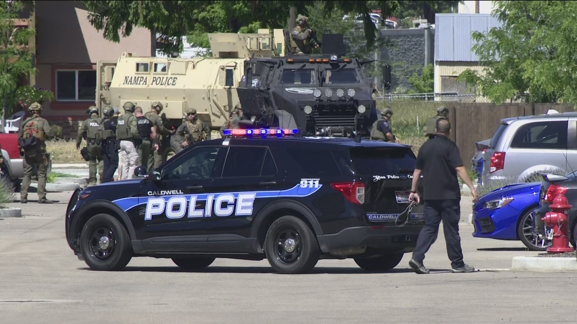 Caldwell Police said a man barricaded himself in an apartment and said he refused to go back to prison.