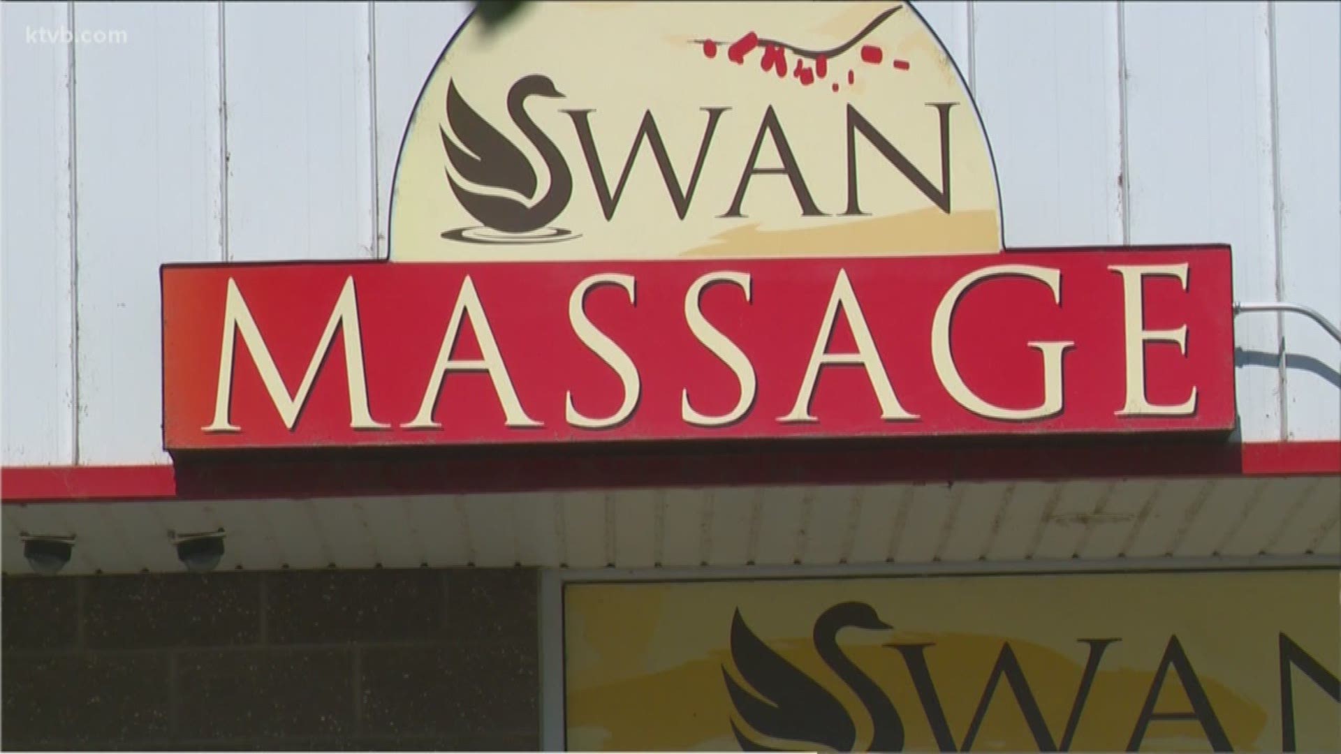Police say the massage parlor employees were offering sex acts for money.