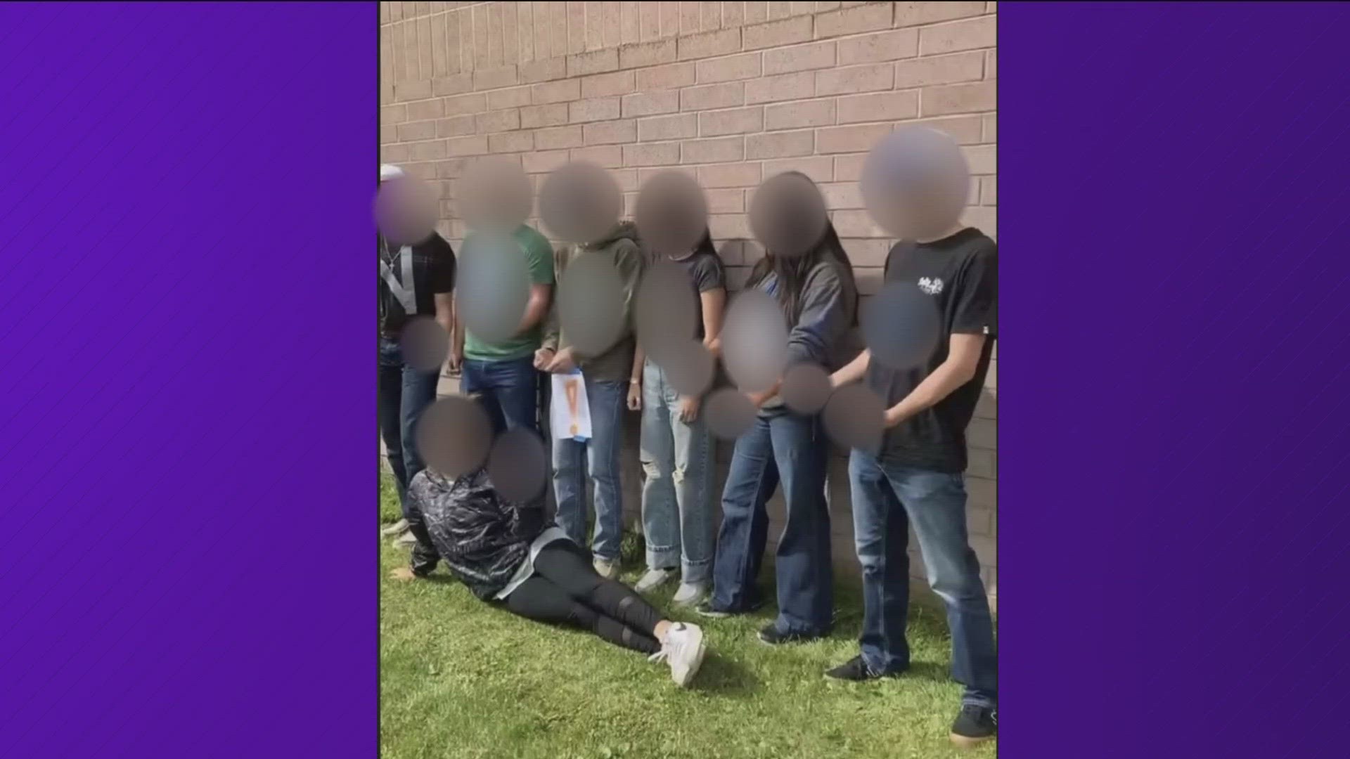 6 students wore letters that spelled out the n-word while surrounding a student and using vulgar hand signs.