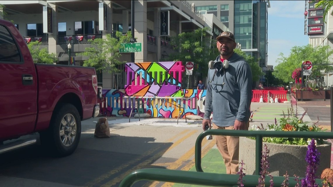 ‘Big orange atrocity’: Boise artist paints 8th Street barriers