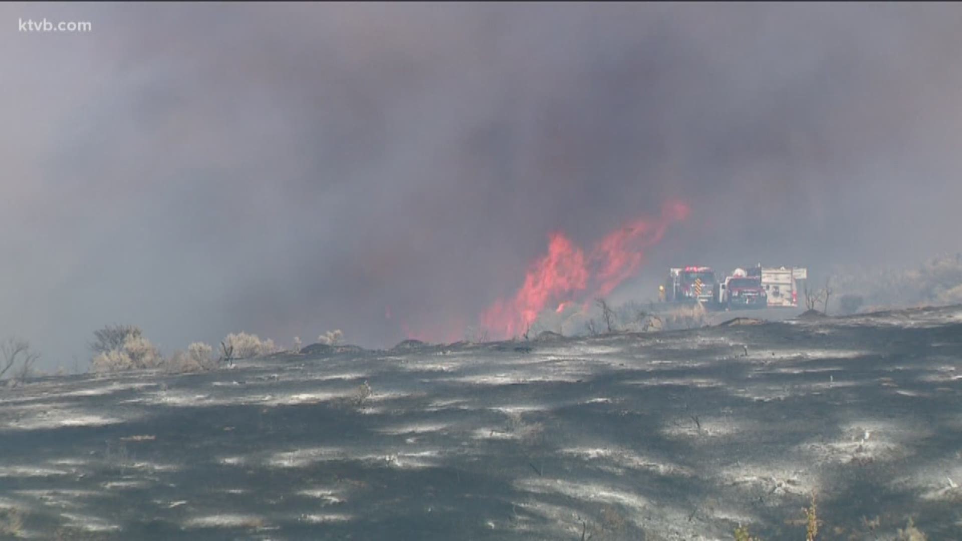 The fire scorched about 50 acres Sunday afternoon and threatened a pair of homes before crews got the fire under control.