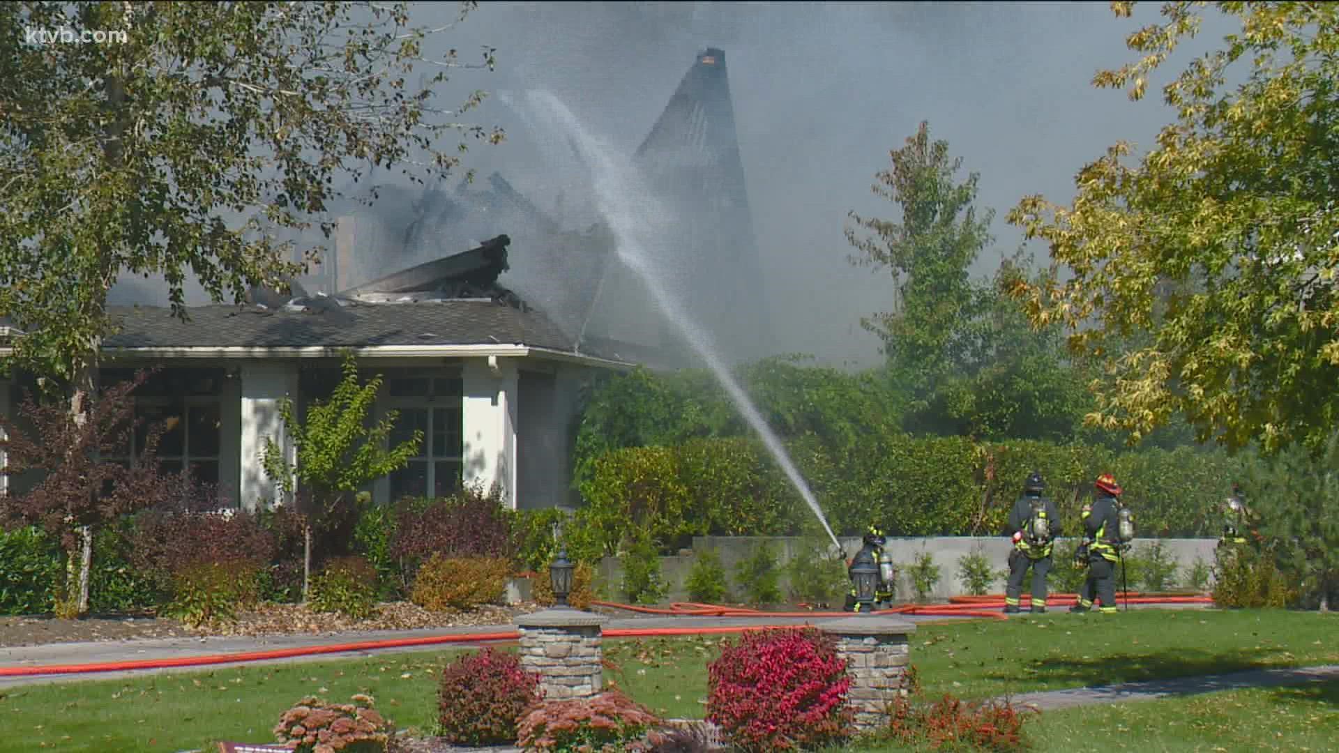 Neighbors called the homeowner about the fire, which broke out at about noon Wednesday on Hidden Island Place.
