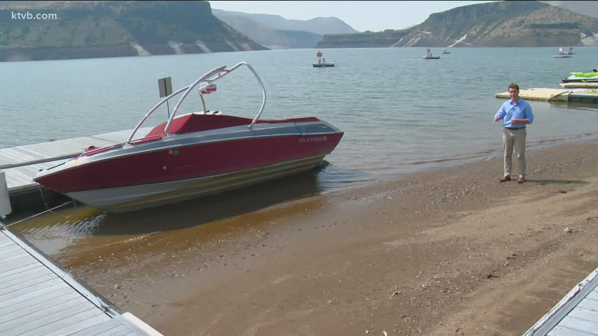Water in Lucky Peak Reservoir near Boise has dropped so quickly, two boats are stuck on what is now the lakeshore.