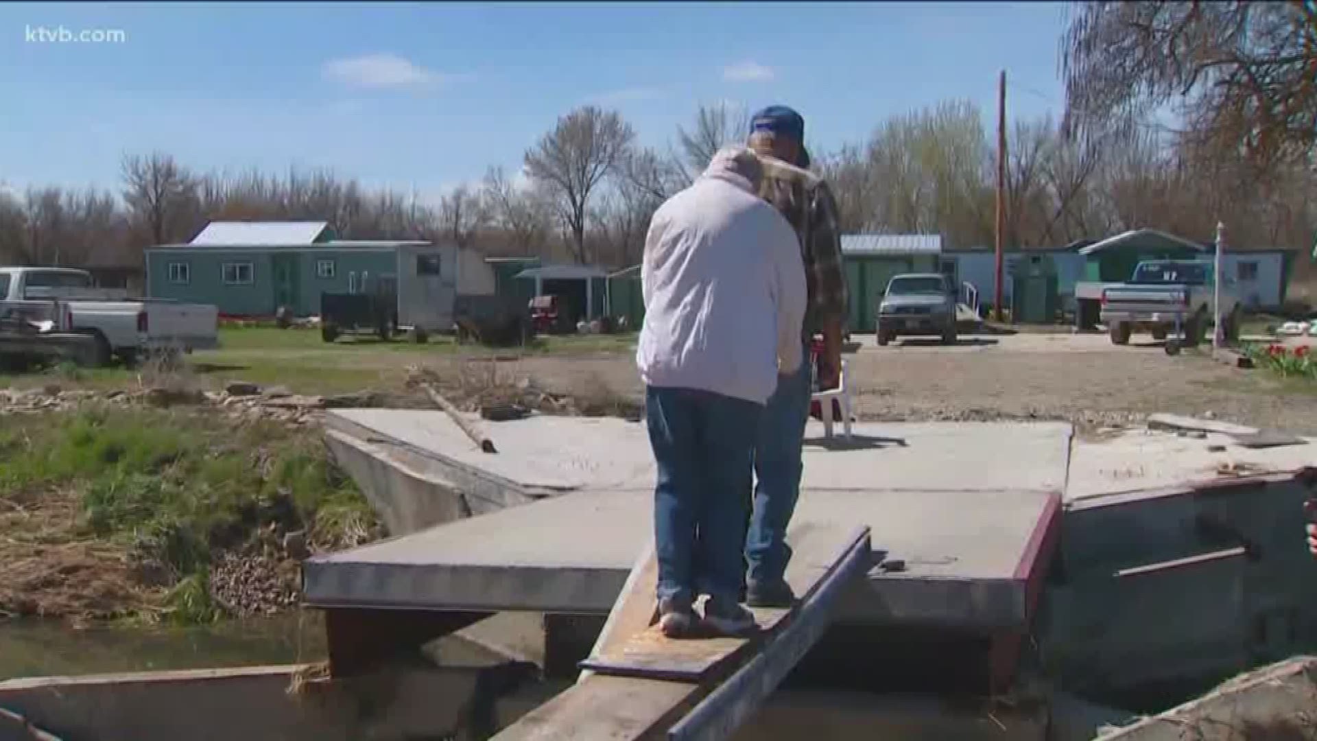 Flood waters took out a portion of a bridge near their New Plymouth home.
