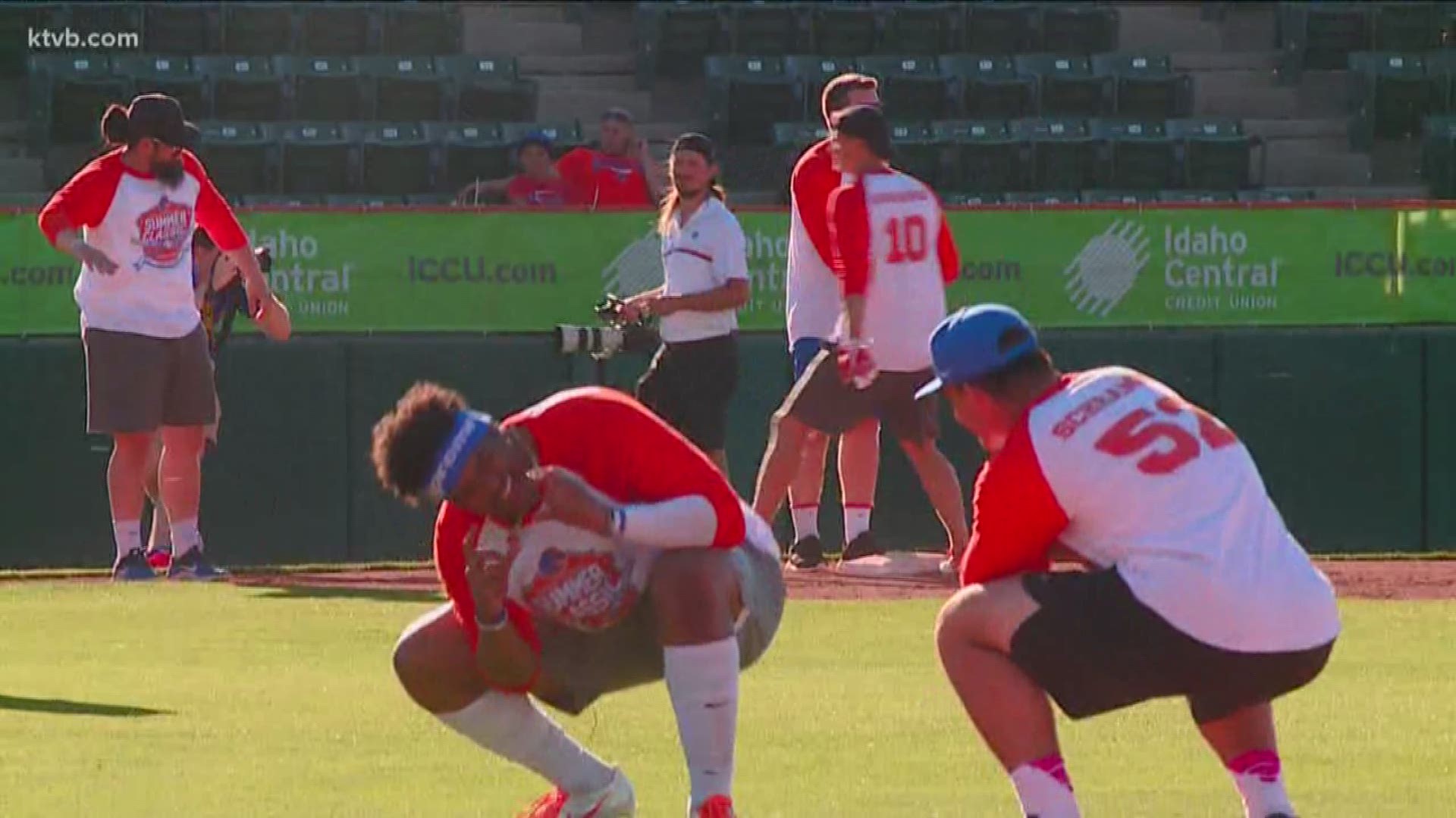 The annual charity softball game between the Boise State football team's offense and defense wasn't even close.