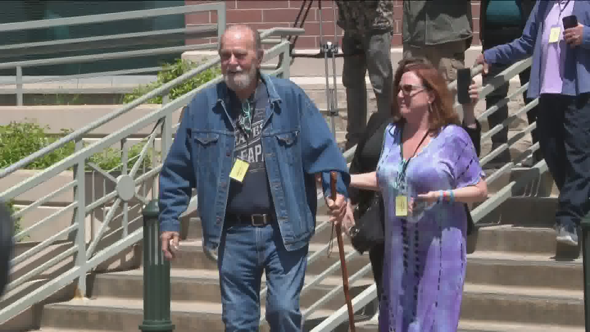 Larry and Kay Woodcock were greeted with cheers from a large crowd outside the courthouse after Lori Vallow was found guilty on all courts on Friday.
