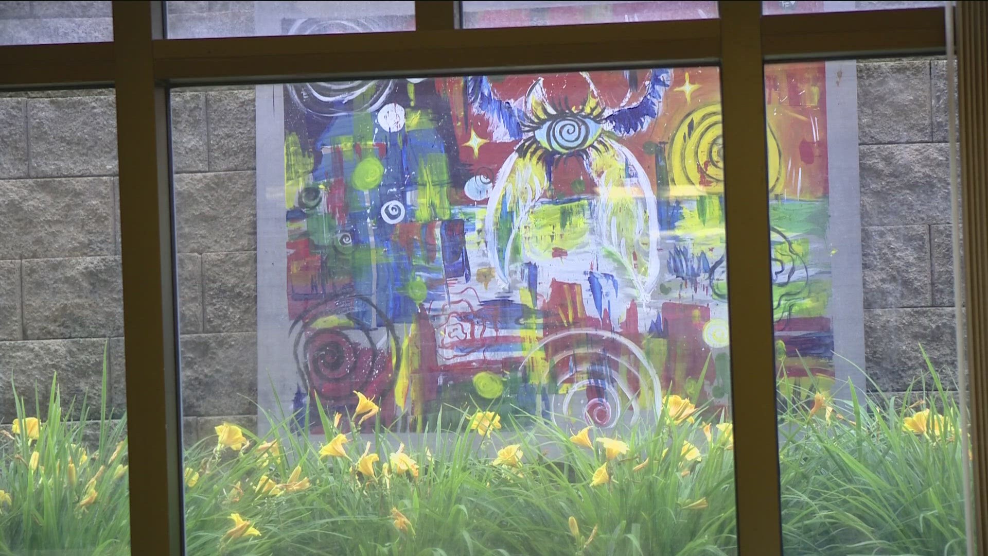 The student created murals "aim to uplift and inspire patients."