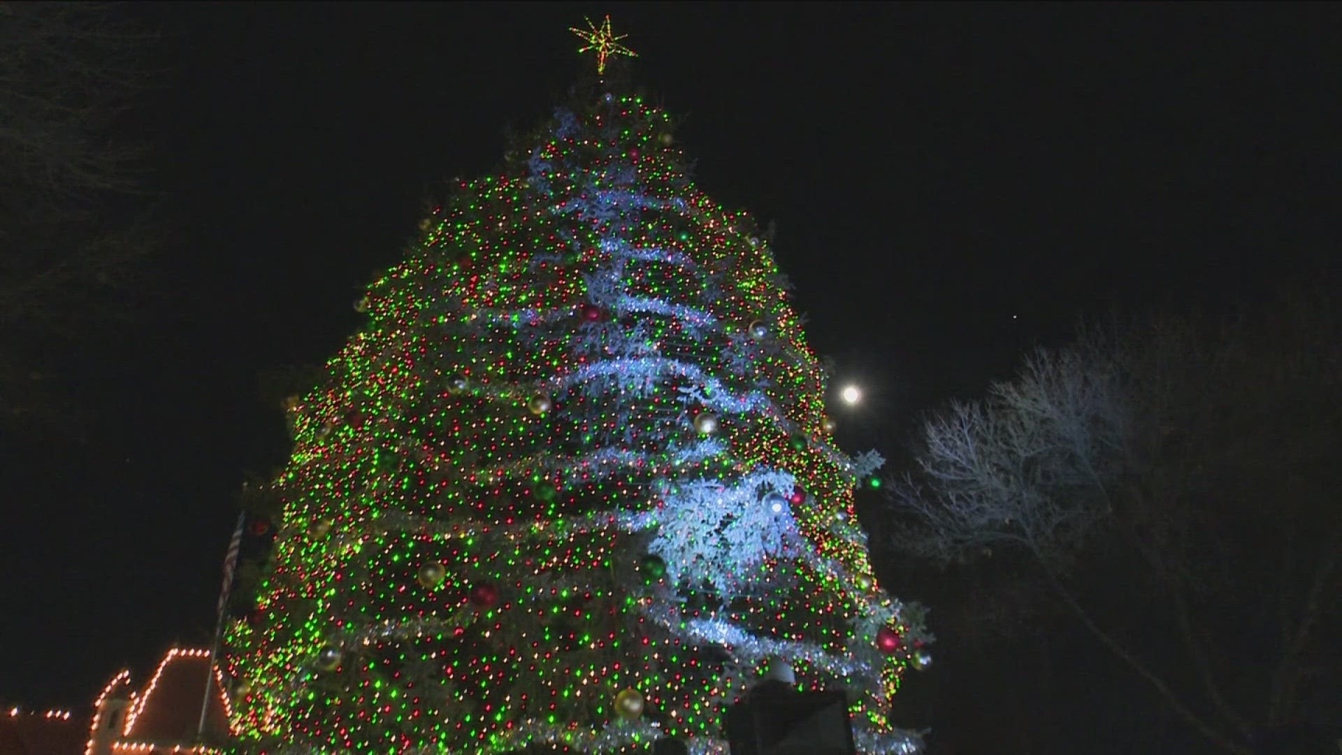 The 51-foot-tall blue spruce will shine bright in front of Nampa's train depot through the holidays.