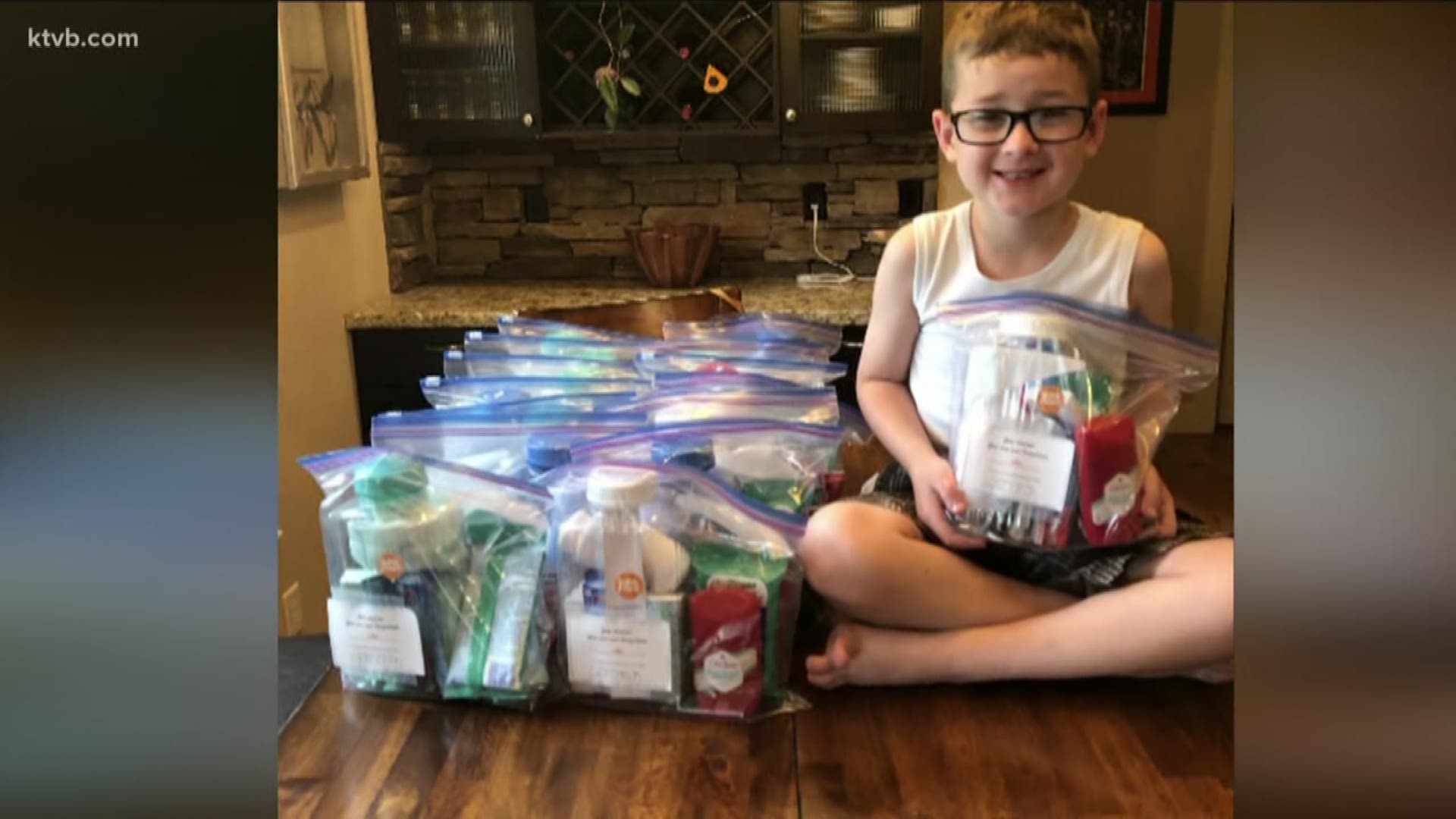 Seven-year-old Cameron uses his allowance to put much-needed supplies into bags for the homeless community. He says passing the kits out makes him happy.