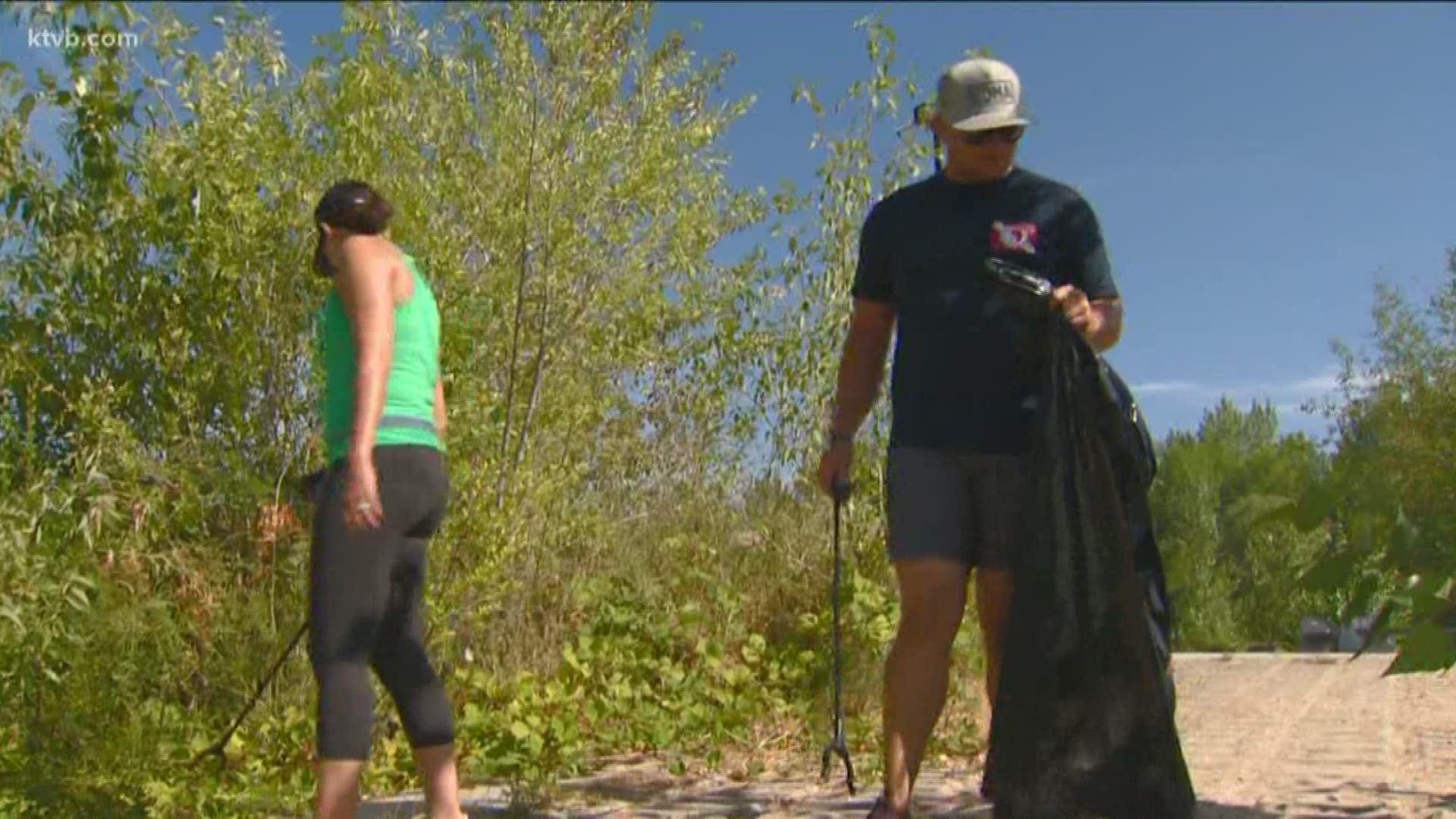 Volunteer picked up trash in parks and along the Boise River Saturday.