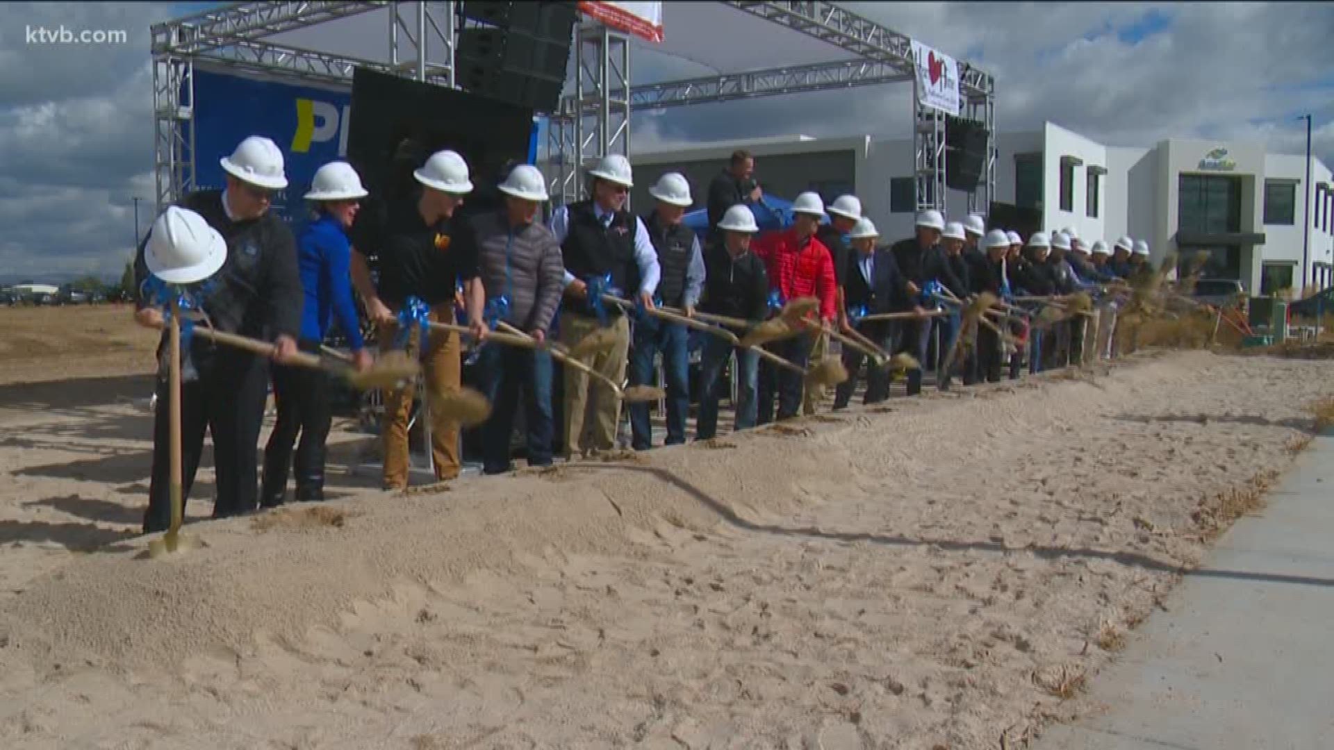 Ground was broken on three new buildings, including a health and wellness facility.