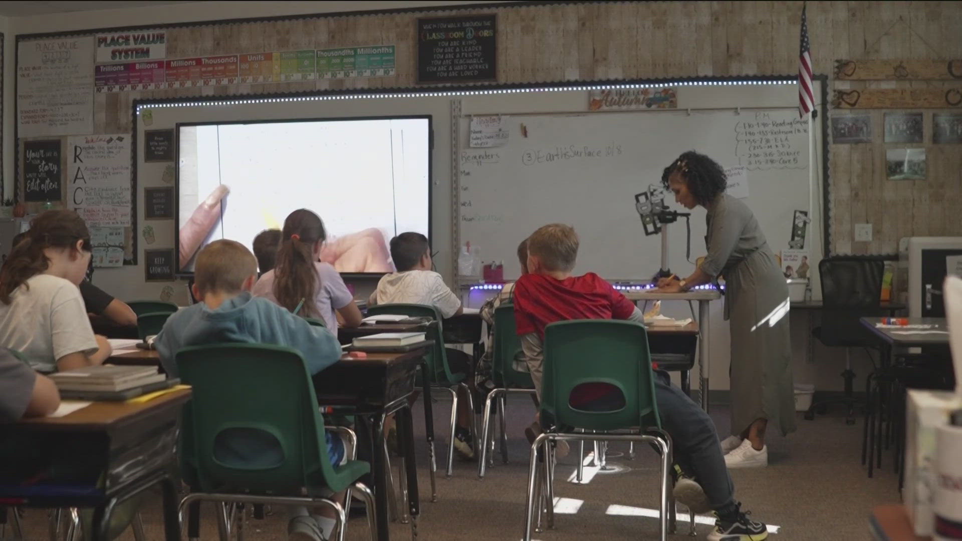 Teachers say the non-traditional schedule helps their mental health, but the cost is stretching school another hour.