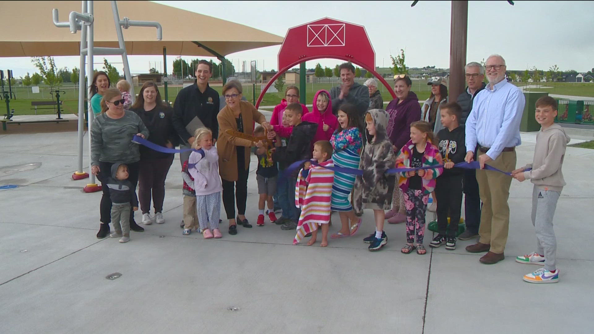 City officals held a ribbon cutting to celebrate the new features at Midway Park.