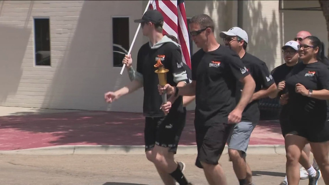 Torch runners carry flame for the Special Olympics Idaho State Summer ...