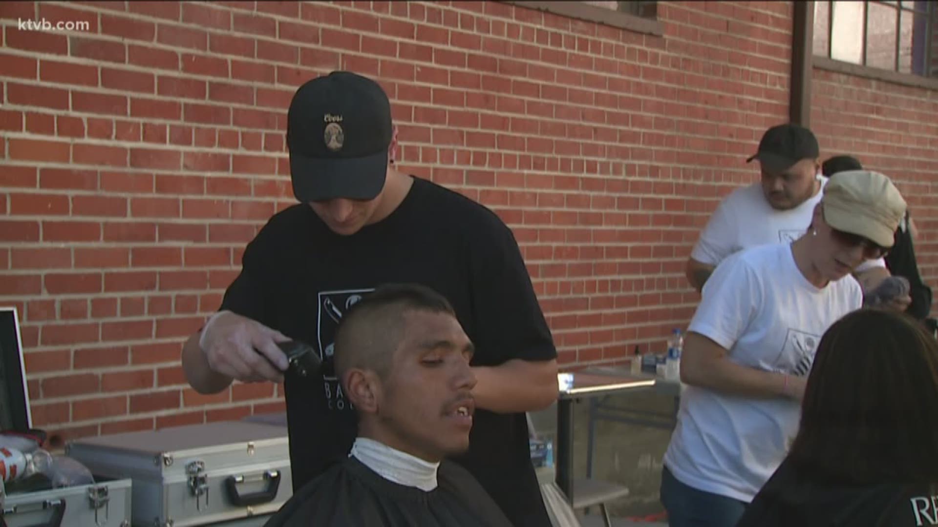 The event was called Neighbor and about 150 people were given free haircuts from the Boise Barber College, turkey legs and ice cream from Brown Surgga Soul Food, and
