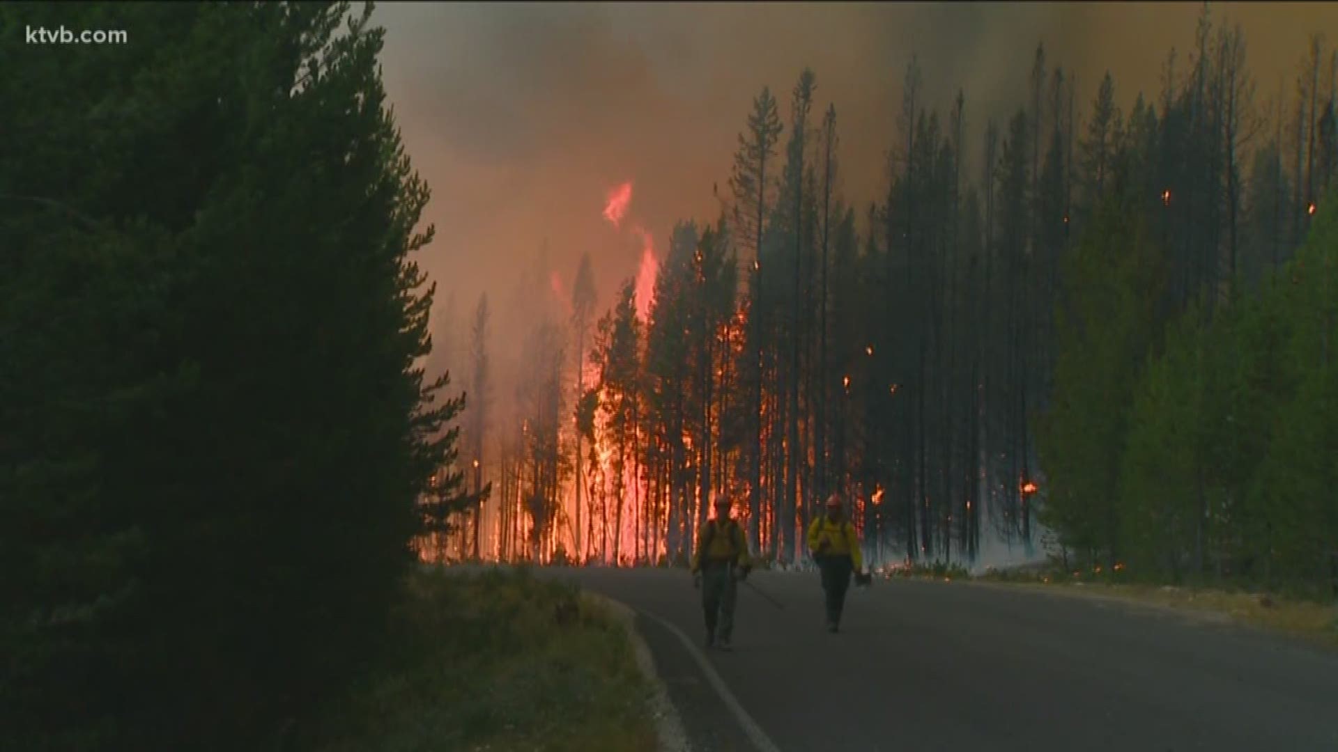 The fire - now about a half-mile from the popular recreation area - is burning next to two critical roads in the area.