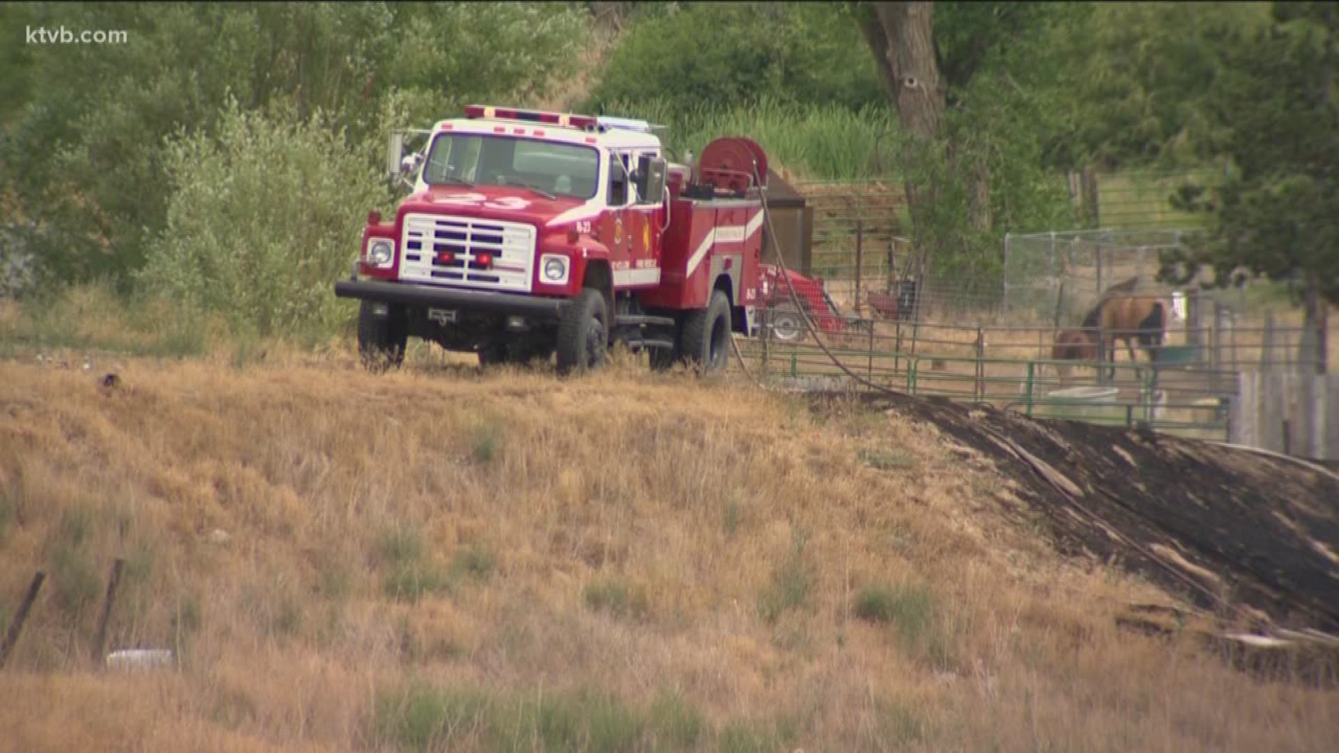 The fire burned an estimated 10-15 acres Saturday afternoon. Some pickups, a boat and three outbuildings were destroyed.
