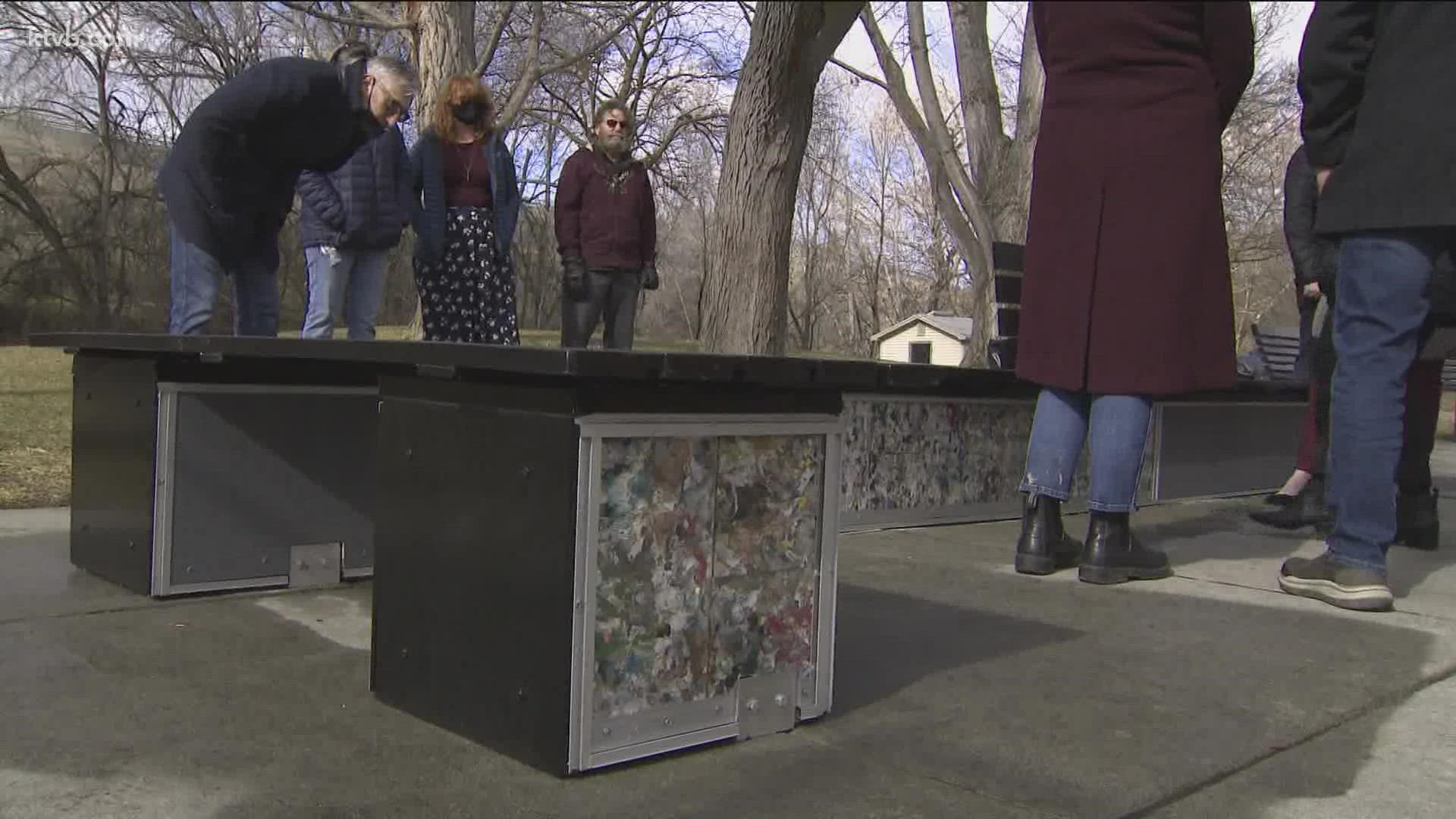 The new bench at Manitou Park is designed by ByFusion. Inside the bench are recycled plastics from residents' orange bags, turned into plastic blocks.