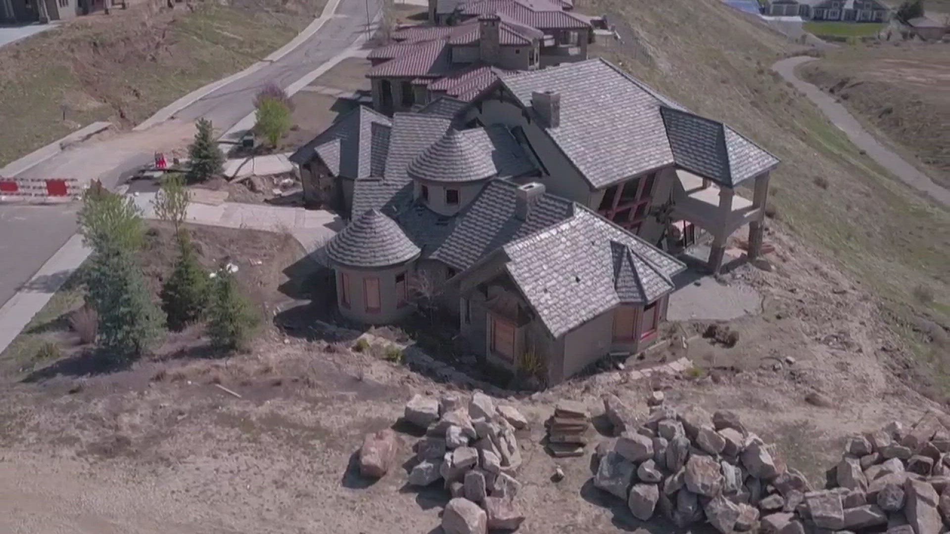 Drone footage of sliding foothills homes