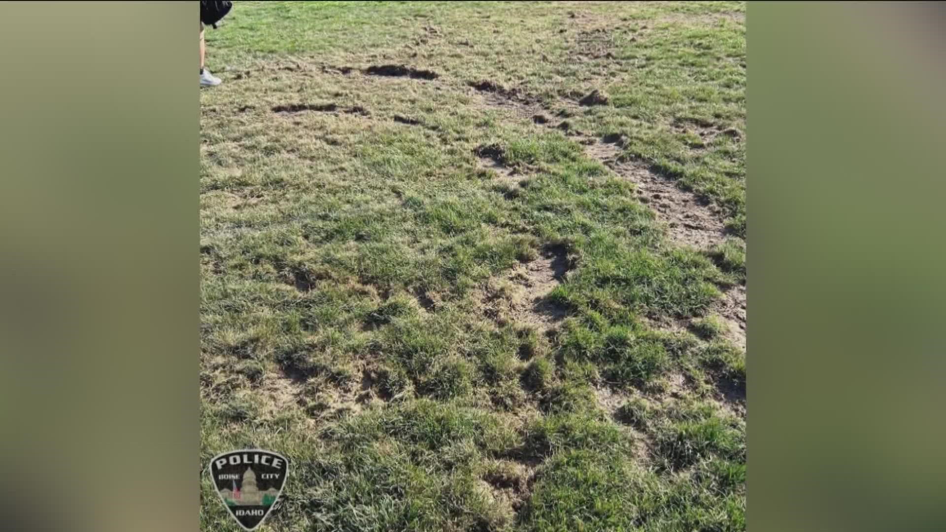 Two men were arrested in connection to the vandalized fields at Capital High School Thursday, according to a press release from the Boise Police Department (BPD).
