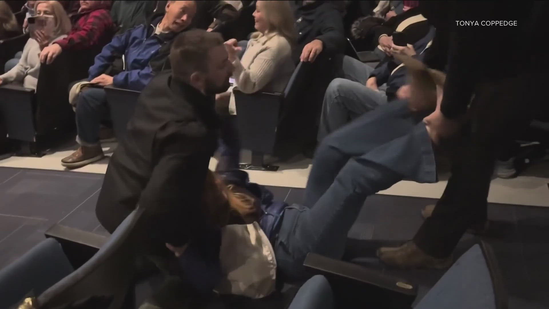 Woman forcibly removed from Coeur d'Alene town hall retains legal ...
