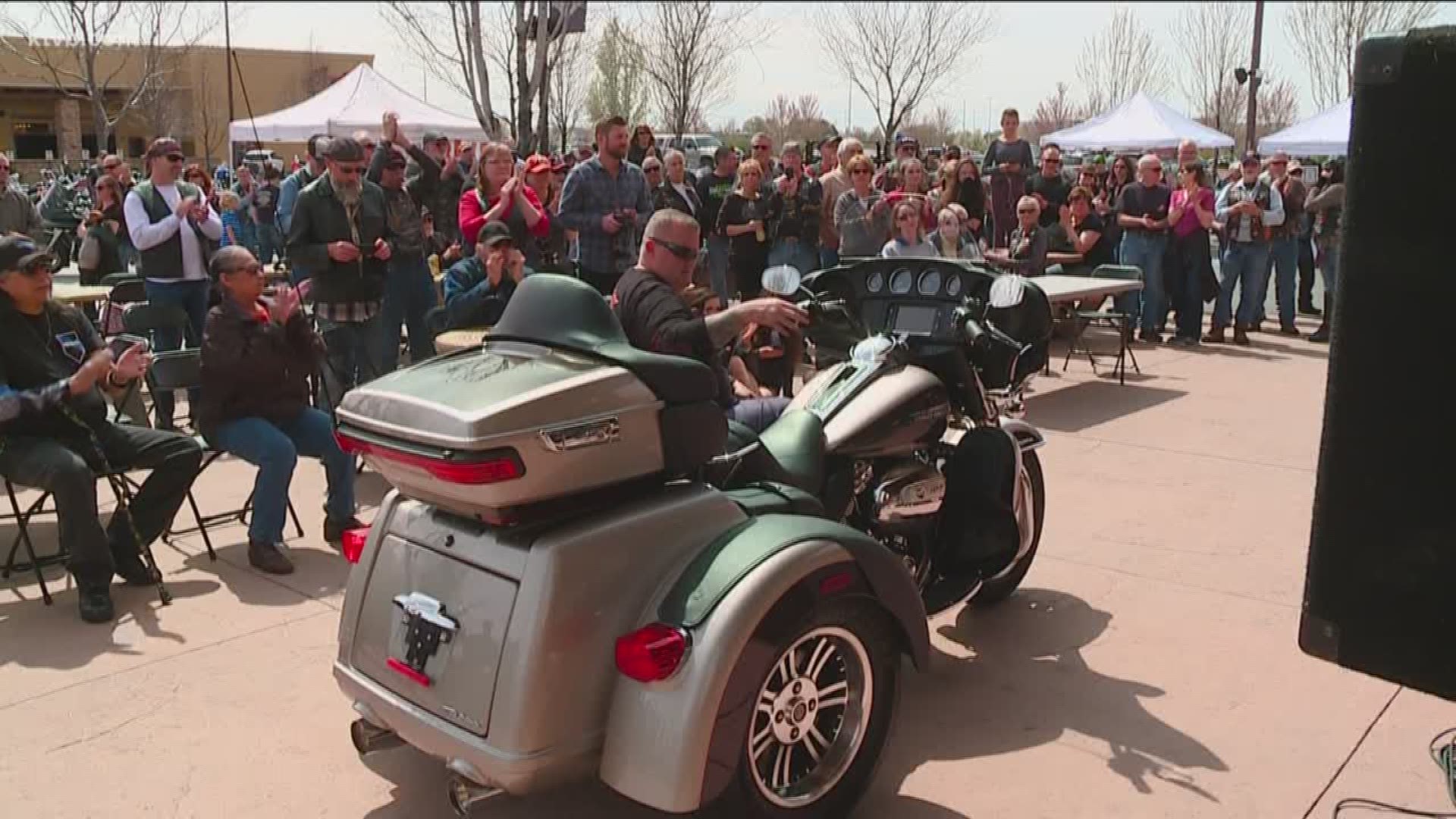 The Boise Police officer who became paralyzed and lost part of his left leg after being shot in the line of duty received an adapted motorcycle, paid for with donations from local businesses and individuals.