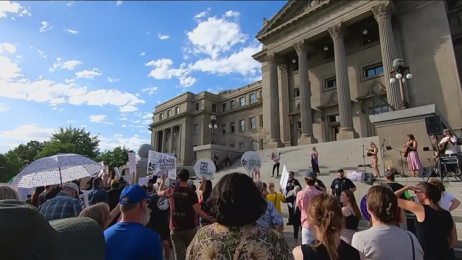 More than 200 people on both sides of the abortion debate gathered at the Idaho Capitol Steps Tuesday evening.