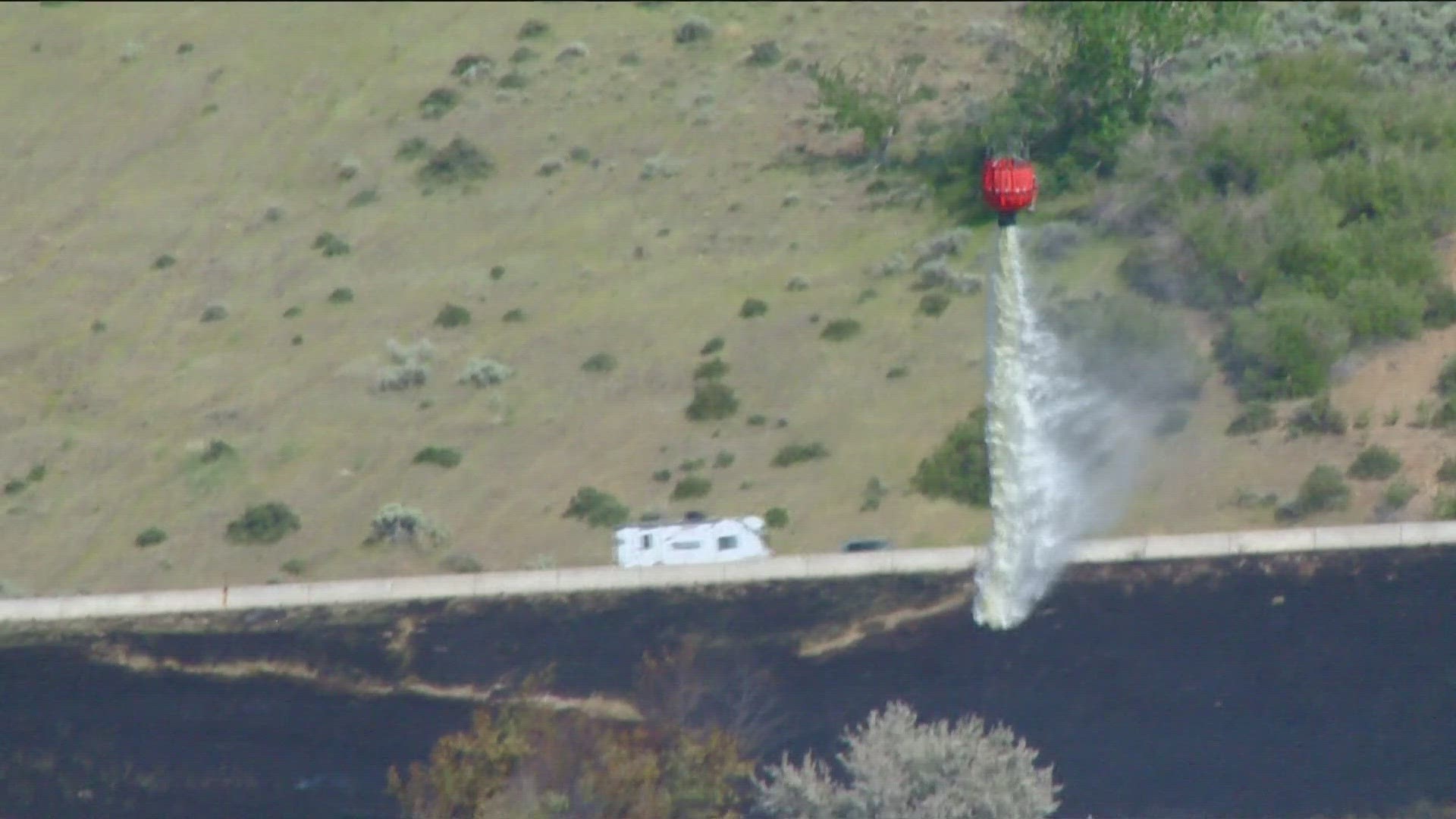 Highway 55 has reopened after a nearby brush fire shut down traffic Friday afternoon. BLM crews contained the 43-acre fire burning south of Horseshoe Bend.