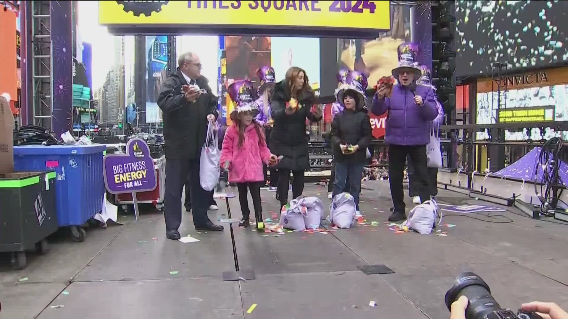 Visitors to Times Square on Friday saw a glimpse of New York City’s iconic New Year’s Eve party as the event's organizers heaved handfuls of confetti.