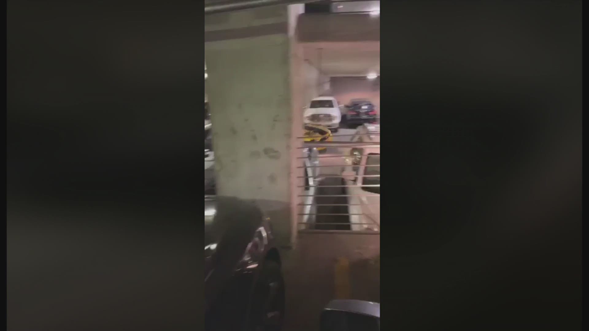 Video provided by Jordan Peterson shows the driver of a yellow Ford Mustang dragging a pickup truck through a downtown Boise parking garage.