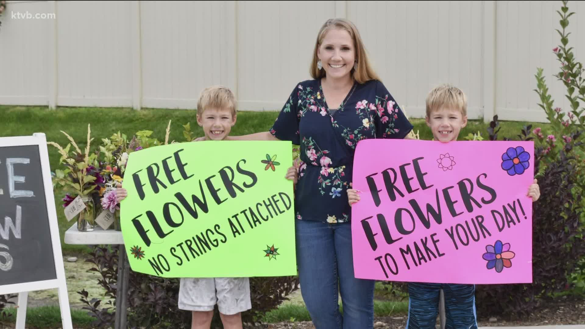 Max and Miles Adams have handed out hundreds of free bouquets to strangers.