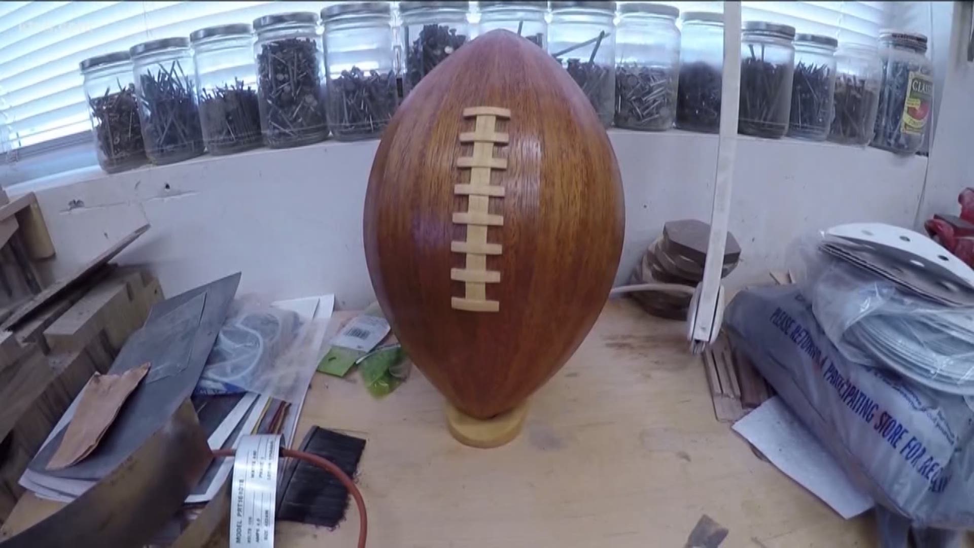 A local woodworker is creating some set props for the NFL Network.