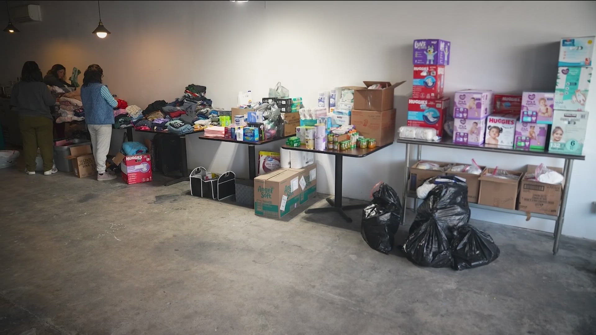 Treasure Valley neighbors unloaded cars, sorted boxes and greeted families impacted by the raid in Wilder that led to the detainment of 105 undocumented people.