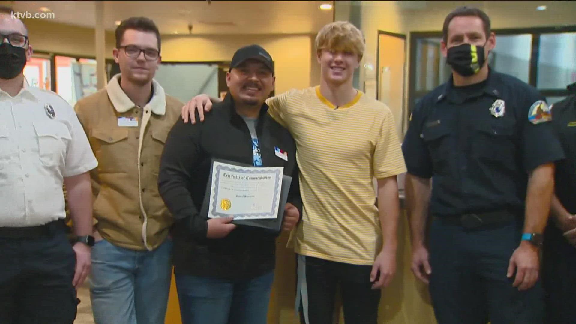 Travis Johnston went into cardiac arrest at the gym, and Gabriel Hernandez kept his heart beating until first responders arrived.