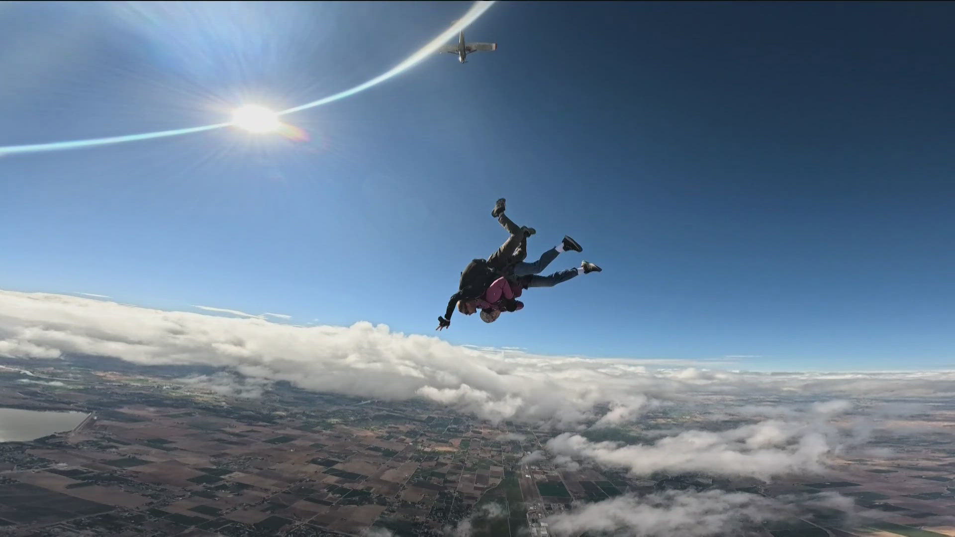 Jan Pedersen marks 85th birthday with tandem skydive alongside granddaughter, continuing adventurous life after pandemic losses of husband and grandson.