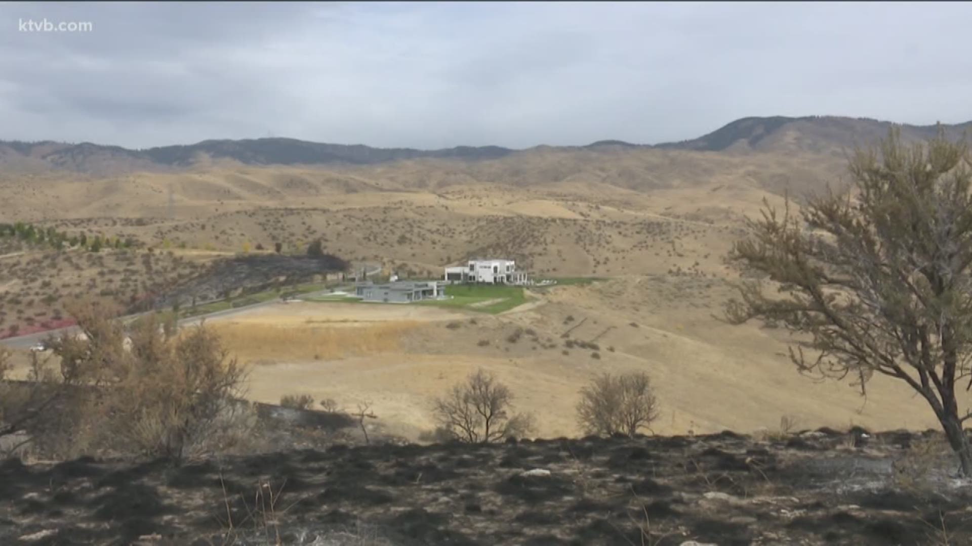 The homes were in the path of a fast-moving grass fire.