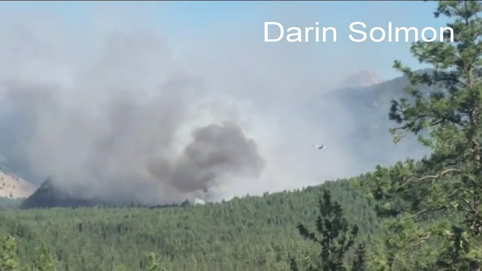 Crews fight wildfire near Grandjean.