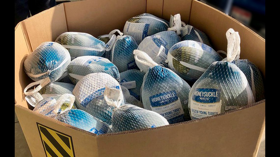 Micron employees donate enough turkeys and hams to feed more than 2,500