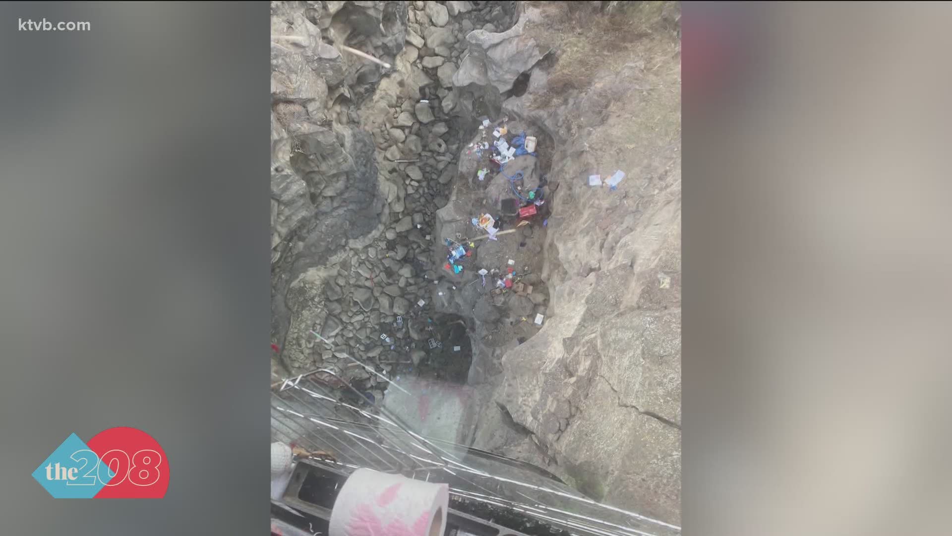 For over an hour, the couple looked down at the 80-foot drop below then, watching their belongings fall to the bottom of the gorge.