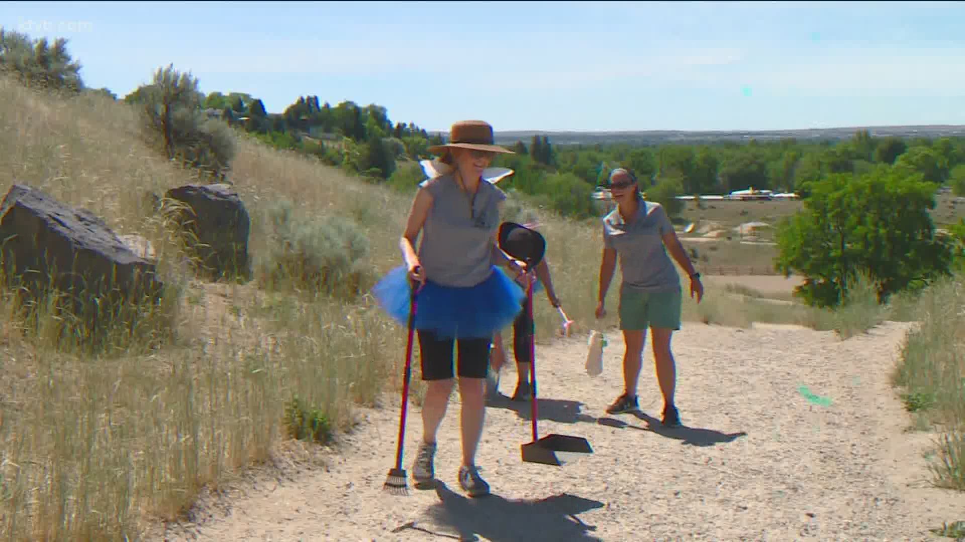 The public was invited to grab a poop bag and clean up around the Foothills.