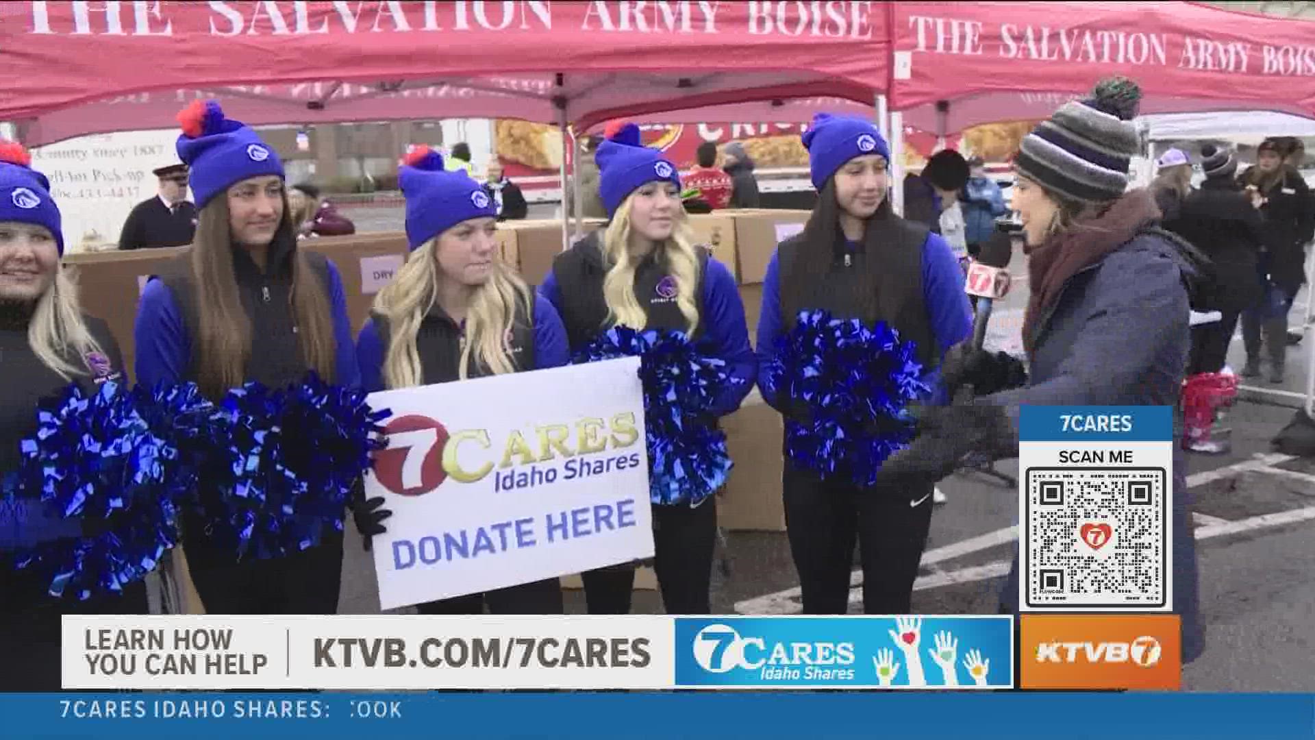 Boise State Cheer Squad volunteers, helping collect donations for 7Cares Idaho Shares.